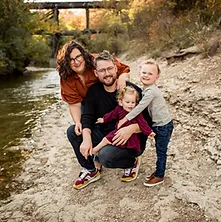 Family of four with their child who is affected by Leigh Syndrome.
